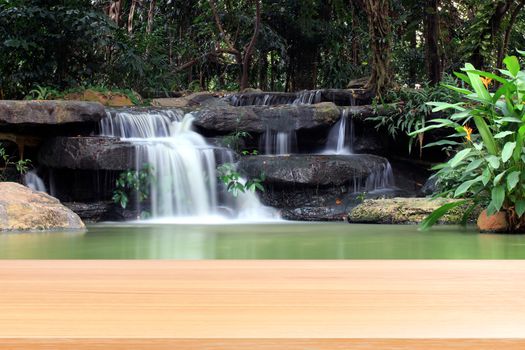 wood plank on waterfall beautiful nature background, empty wood table floors on nature waterfall fresh, wood table board empty on garden waterfall in suan luang rama IX (9) bangkok thailand