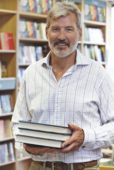 Portrait Of Male Bookshop Owner