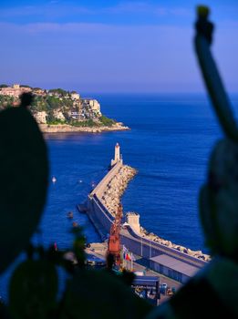 The lighthouse at the Port of Nice on the Mediterranean Sea at Nice, France along the French Riviera.