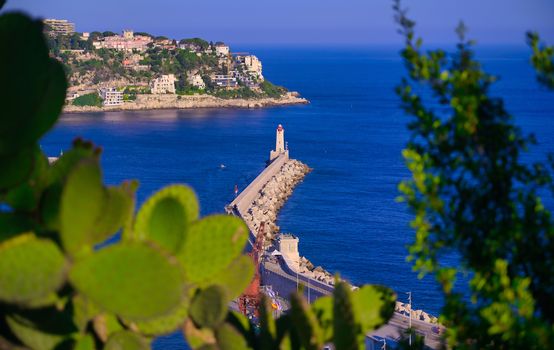 The lighthouse at the Port of Nice on the Mediterranean Sea at Nice, France along the French Riviera.