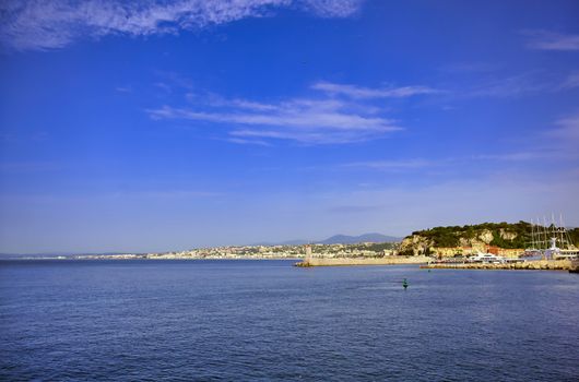 The lighthouse at the Port of Nice on the Mediterranean Sea at Nice, France along the French Riviera.