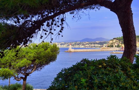 The lighthouse at the Port of Nice on the Mediterranean Sea at Nice, France along the French Riviera.