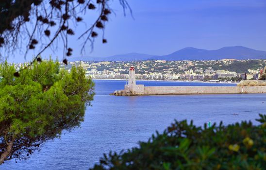 The lighthouse at the Port of Nice on the Mediterranean Sea at Nice, France along the French Riviera.