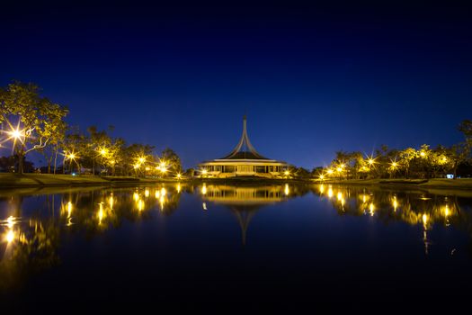 Building at night garden landscape view reflection on water