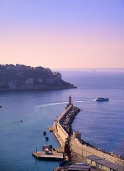 The lighthouse at the Port of Nice on the Mediterranean Sea at Nice, France along the French Riviera.