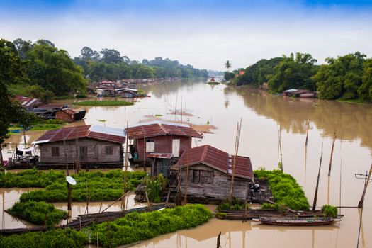 Floating wooden house village on river located at north of Thailand