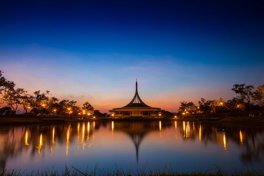 Building at night garden landscape view reflection on water