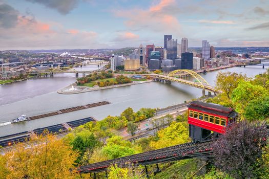 Downtown skyline and vintage incline in Pittsburgh, Pennsylvania, USA at sunset