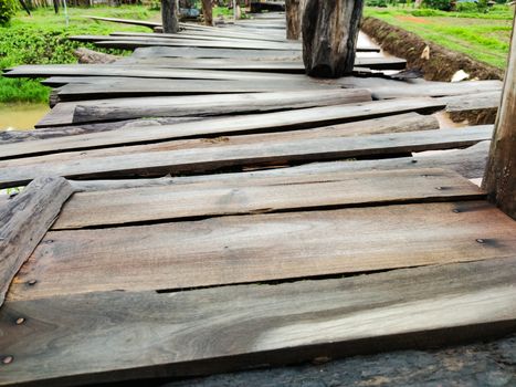 close-up Timber construction walking path with no regulations, Thailand.