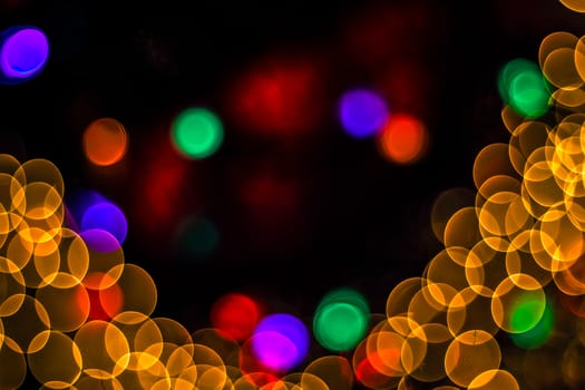 Background of abstract booble bokeh lights. Natural defocused photo. Christmas light blurred, abstract background. Garland. Copy space.