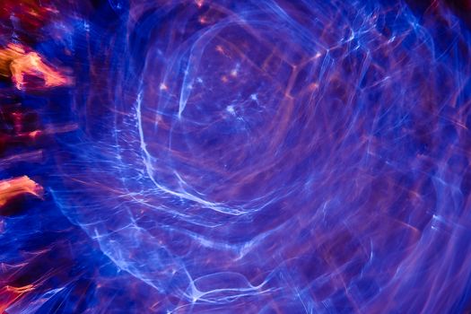 Space Background with Colorful Galaxy Clouds. Beautiful of universe. Abstract lens flare. Concept image of space or time travel background over dark colors and bright lights. Copy space.