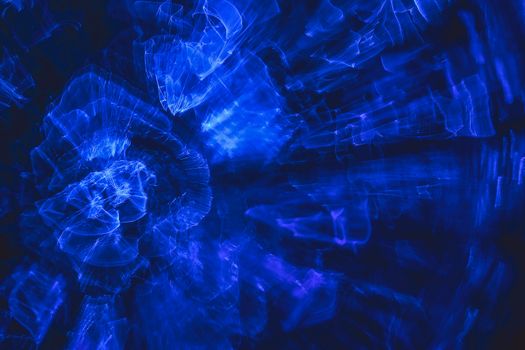 Space Background with Blue Galaxy Clouds. Beautiful of universe. Abstract lens flare. Concept image of space or time travel background over purple colors and bright lights. Copy space.

