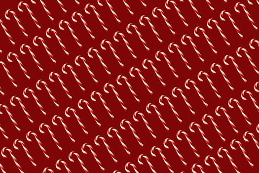 Flat lay Candy Canes pattern on a red background.