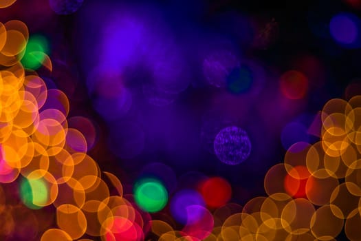 Background of abstract booble bokeh lights. Natural defocused photo. Christmas light blurred, abstract background. Garland. Copy space.