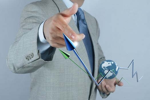 businessman hand drawing a pie chart and 3d graph