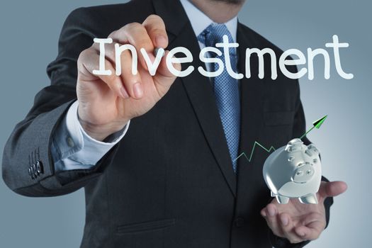 businessman hand pointing to investment concept