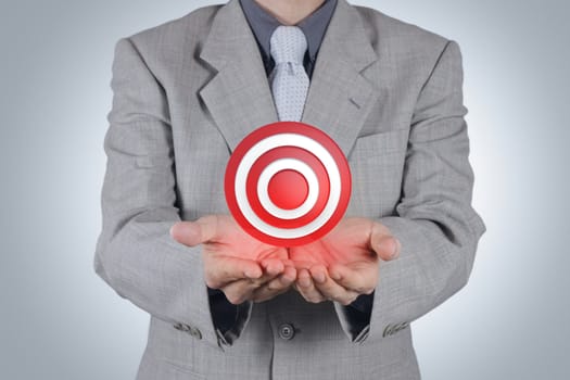 businessman hand pointing target symbol as success concept