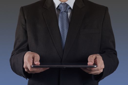 businessman hand using tablet computer