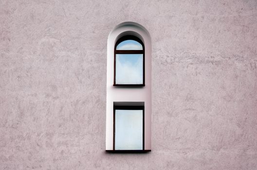 one window and gray wall of an old vintage building architectural background