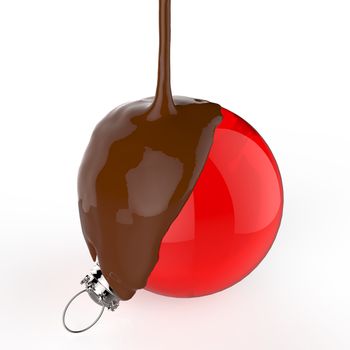melt chocolate on Christmas ball ornament on white