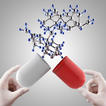 Stethoscope in hand with capsule pill and molecule as medical concept