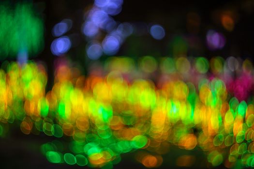 Background of abstract bubble bokeh lights. Natural defocused photo. Christmas light blurred, abstract background. Copy space.