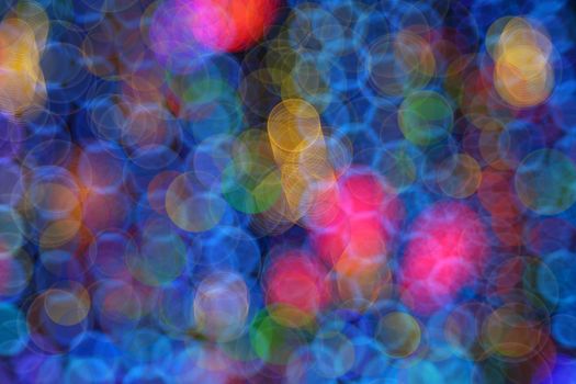 Abstract, defocused, blurred Christmas light bokeh background. Multicolor bubble bokeh, circle background. 