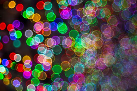 Festive Christmas elegant abstract background with booble bokeh multicolored lights. Background with defocused lights. Classic bokeh .Copy space.