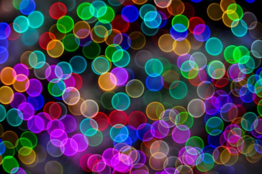 Festive Christmas elegant abstract background with booble bokeh multicolored lights. Background with defocused lights. Classic bokeh .Copy space.