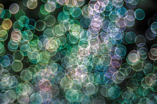 Festive Christmas elegant abstract background with booble bokeh multicolored lights. Background with defocused lights. Classic bokeh .Copy space.