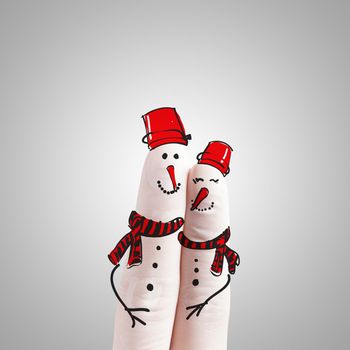 A lovely couple hand drawn and finger as snowmen as concept