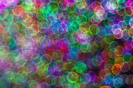 Festive Christmas elegant abstract background with booble bokeh multicolored lights. Background with defocused lights. Classic bokeh .Copy space.