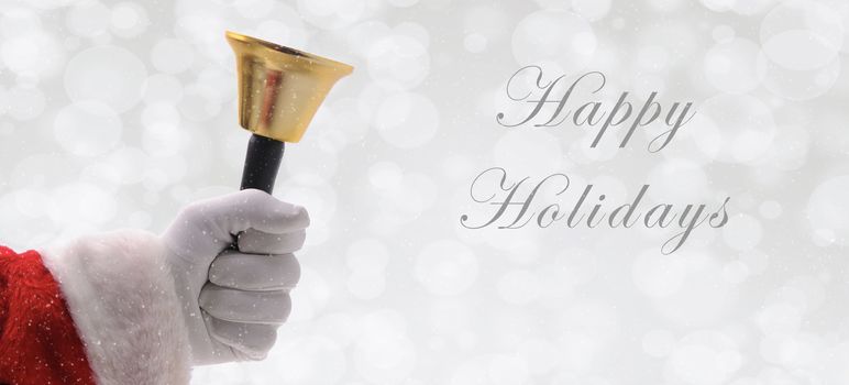 Closeup of Santa Ringing a gold bell over a silver bokeh background with snow effect, with the words Happy Holidays
