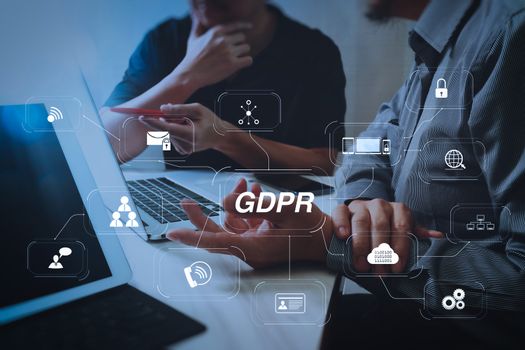 GDPR. Data Protection Regulation with Cyber security and privacy virtual diagram.Business team meeting. Photo professional investor working new start up project. Finance task.Digital tablet docking keyboard laptop computer.