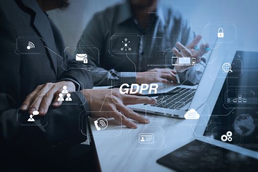 GDPR. Data Protection Regulation with Cyber security and privacy virtual diagram.Business team meeting. Photo professional investor working new start up project. Finance task.Digital tablet docking keyboard laptop computer.