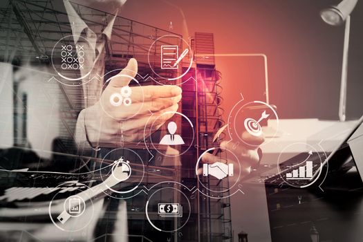 Business process management with workflow automation diagram and gears in virtual flowchart.businessman working with smart phone and digital tablet and laptop computer in modern office with London city exposure