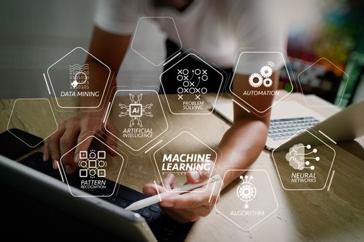 Machine learning technology diagram with artificial intelligence (AI),neural network,automation,data mining in VR screen.Website designer working digital tablet dock keyboard and computer laptop with smart phone.