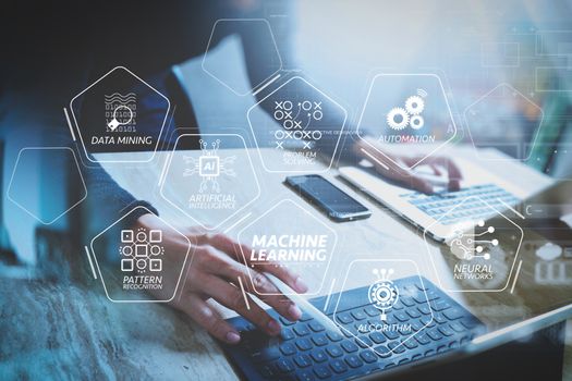 Machine learning technology diagram with artificial intelligence (AI),neural network,automation,data mining in VR screen.Website designer working digital tablet dock keyboard and computer laptop with smart phone.