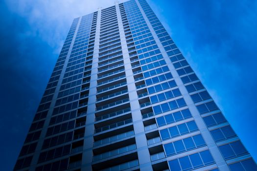 Photo of modern building in business area of Bangkok under clear sky