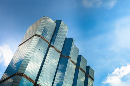 Photo of modern building in business area of Bangkok under clear sky