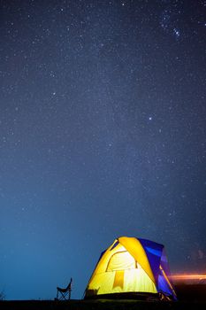 Milkyway and star with camping tent at night time