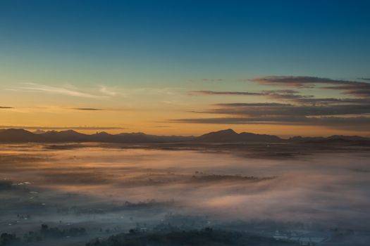 Colorful sky of sunrise above mountain on cloudy at winter season location at Loei province north east of Thailand