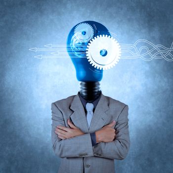 Thinking about structuring virtual diagram of business process with solutions. businessman with lamp-head 3d metal brain as concept 