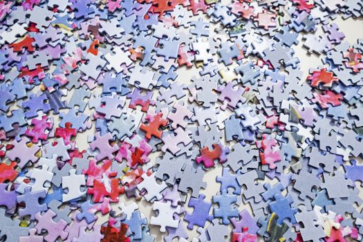 close up jigsaw puzzle pieces on background