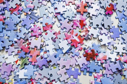 close up jigsaw puzzle pieces on background