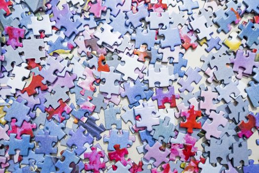 close up jigsaw puzzle pieces on background