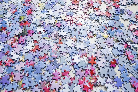 close up jigsaw puzzle pieces on background