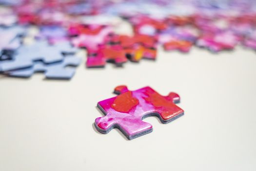 close up jigsaw puzzle pieces on background