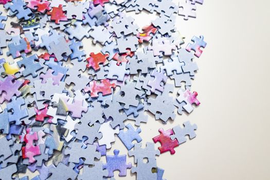 close up jigsaw puzzle pieces on background