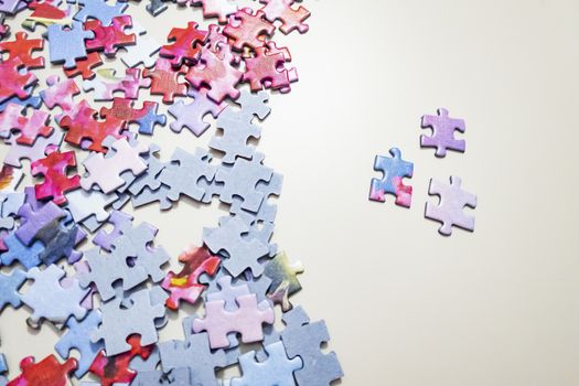 close up jigsaw puzzle pieces on background